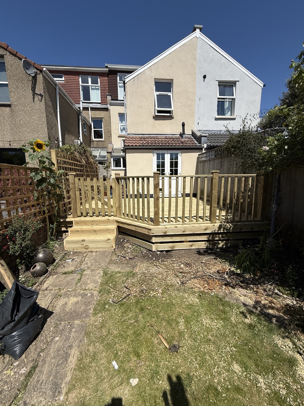 Raised garden decking with timber balustrade
